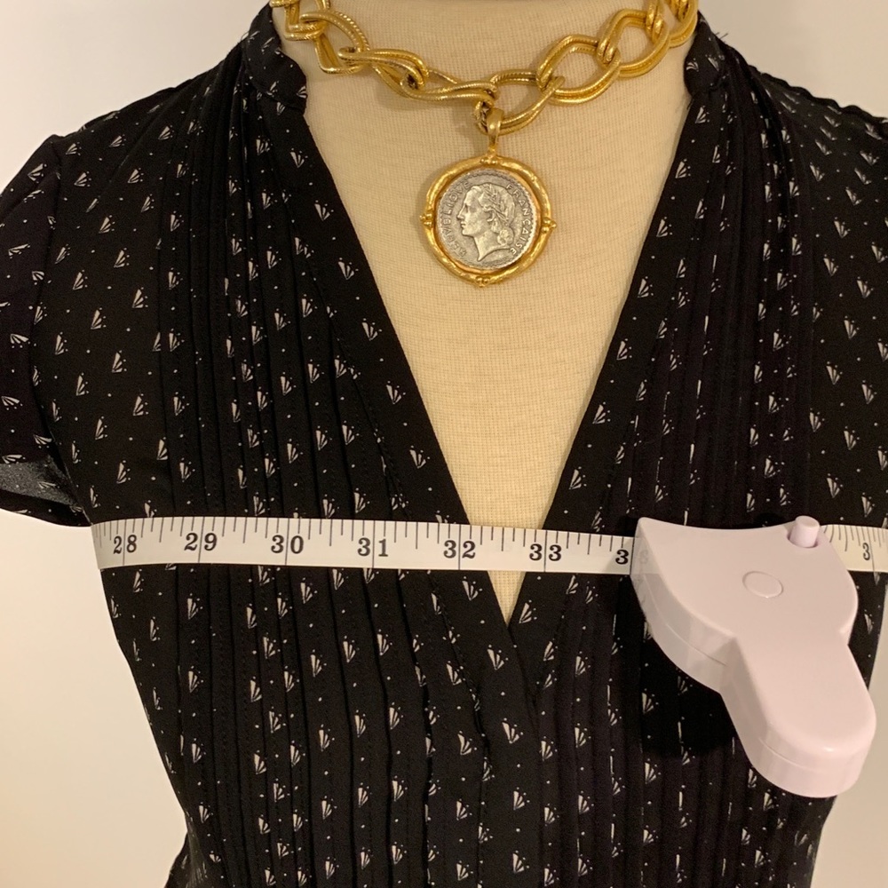 NWOT.Black with white design Blouse